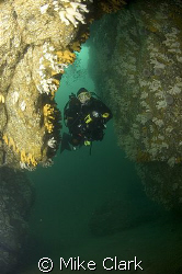 Diver in cave, Eyemouth, Scotland.
Nikon D70, 10.5mm len... by Mike Clark 